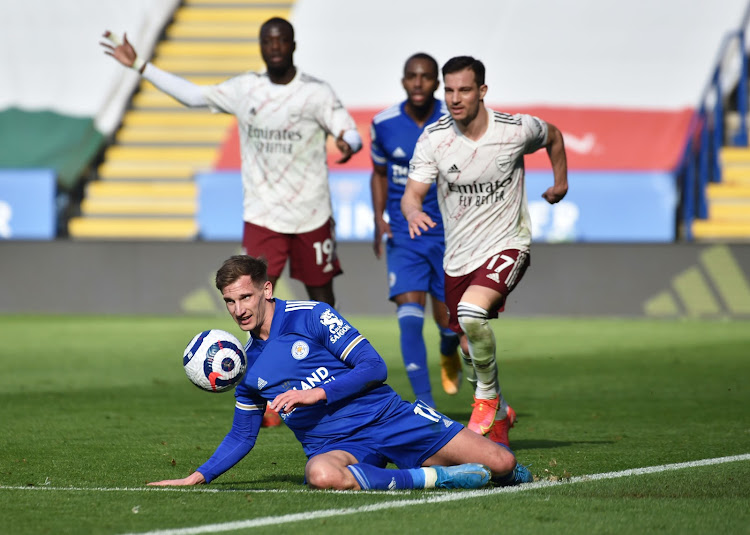 Leicester City's Marc Albrighton in action with Arsenal's Cedric Soares