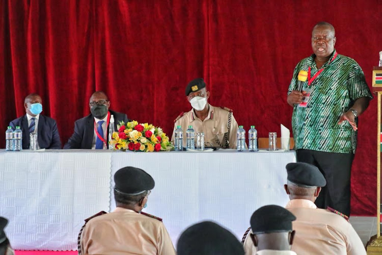 Interior CS Fred Matiang'i addressing deputy county commissioners, assistant county commissioners, chiefs and their assistants from Makueni county.