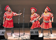 SWING IT: The Mahotella Queens in 2008. From left, Nobesuthu Mbadu, Hilda Tloubatla and Mildred Mangxola