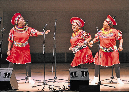 SWING IT: The Mahotella Queens in 2008. From left, Nobesuthu Mbadu, Hilda Tloubatla and Mildred Mangxola