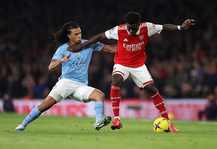 Bukayo Saka of Arsenal battles with Nathan Ake of Manchester City in the Premier League match at Emirates Stadium on February 15 2023. The two teams meet again in a huge title clash at Etihad Stadiumon Wednesday.