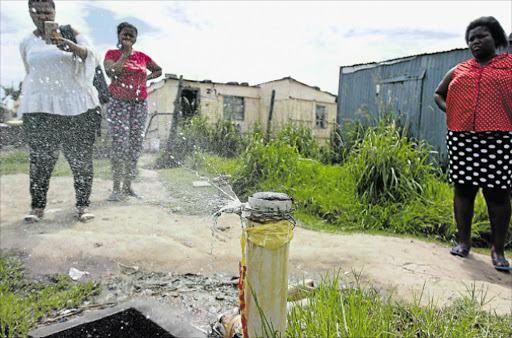 NEGLECTED: Residents of NU3 in Mdantsane have been forced to live next to gushing taps Picture: MICHAEL PINYANA