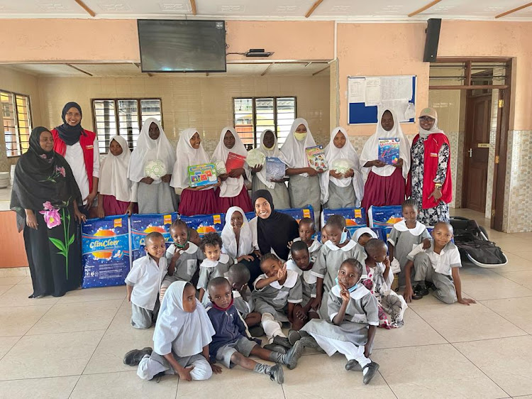 The girls with the donated goodies in Kwale.