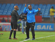 Mamelodi Sundowns coach Pitso Mosimane is told by the fourth official to go back to within his technical area during a Absa Premiership 0-0 home draw against Highlands Park on August 22 2018 at Loftus Versfeld Stadium. 