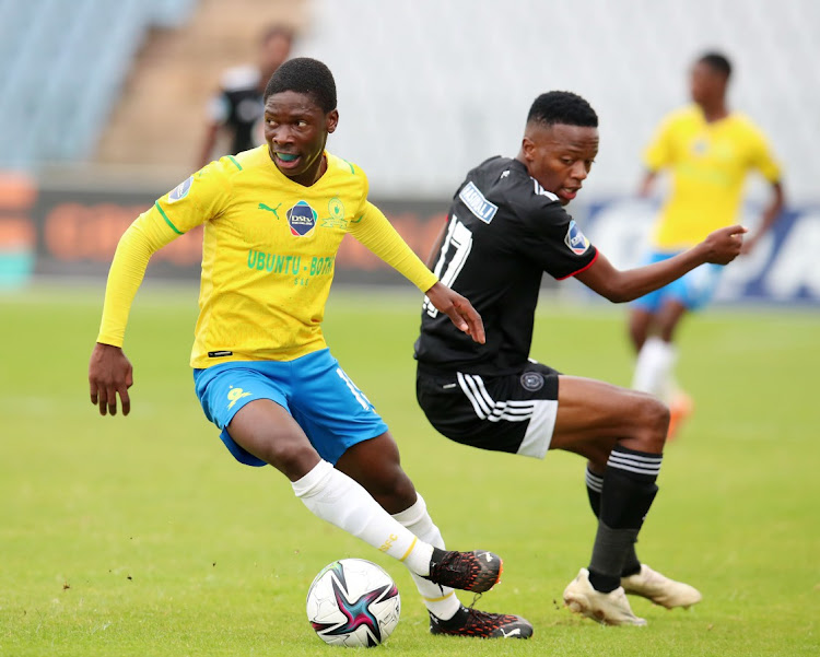 Paul Mhlanga of Sundowns challenged by Mpumelelo Ndaba of Orlando Pirates during the DStv Diski Challenge 2021/22 match between Orlando Pirates and Mamelodi Sundowns.