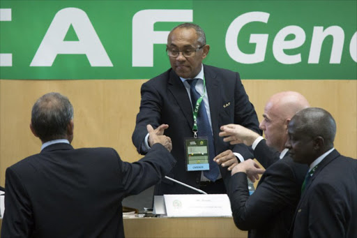 Ahmad (C) of Madagascar is congratulated by Fifa president Gianni Infantino (2ndR) after being elected the new president of the Confederation of African Football (CAF) in Addis Ababa on 16 March 2017. Madagascar's football chief Ahmad Ahmad was elected president of the Confederation of African Football today, ousting veteran leader Issa Hayatou after 29 years in office.