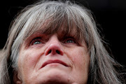 A supporter cries as US President Donald Trump speaks during a campaign rally for Republican Senate candidate Matt Rosendale in Belgrade, Montana. 