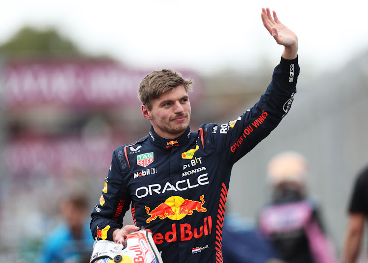 Pole position qualifier Max Verstappen celebrates in parc ferme during qualifying ahead of the F1 Grand Prix of Australia at Albert Park Grand Prix Circuit on April 01, 2023 in Melbourne, Australia.