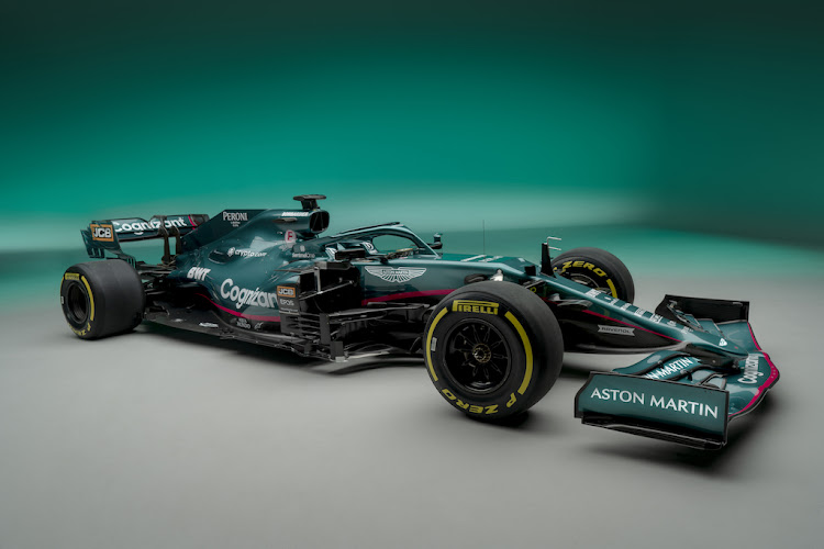 Four-times world champion Sebastian Vettel, freshly arrived from Ferrari, and Canadian Lance Stroll will be the ones with the licence to thrill in the sleek green AMR21 car that marks Aston Martin's return to F1.