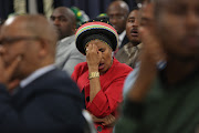 Apostle Nino Mahaye praying during an interfaith memorial service for the victims of lasts weeks flood in Durban.