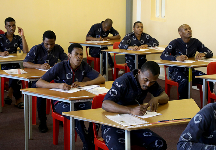 Inmates at Westville prison in Durban writing their final matric exam paper.