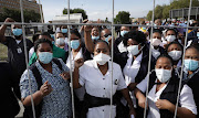 Healthcare workers at Tygerberg Hospital marked International Nurses' Day by taking to the streets to express their grievances about the conditions under which they work during the Covid-19 pandemic.