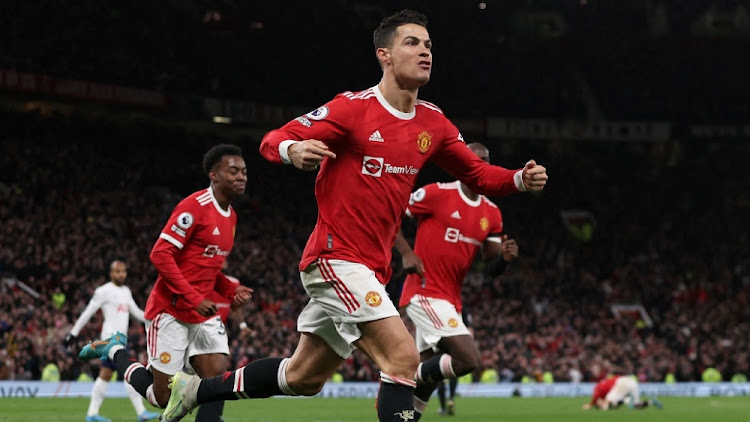 Manchester United's Cristiano Ronaldo celebrates scoring a hat-trick against Tottenham Hotspur at Old Trafford, Manchester, on Saturday. Picture: PHIL NOBLE / REUTERS