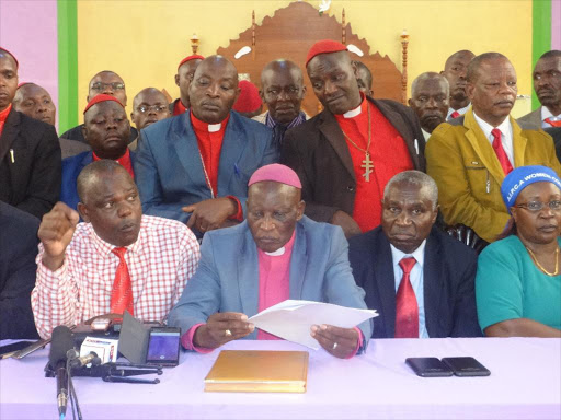 AIPCA chairman Paul Gichu (2nd L), Archbishop Julius Njoroge and secretary general Samuel Mburu at Thika AIPCA /JOHN KAMAU