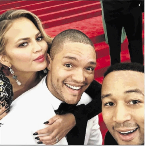 GOOD TIMES: Trevor Noah takes a selfie with US crooner John legend and wife Chrissy Teigen PHOTO: INSTAGRAM