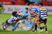 Ruan Steenkamp of the Blue Bulls tries to evade a tackle during the Currie Cup game between the Blue Bulls and Western Province at Loftus Versveld in Pretoria on October 13 2018.