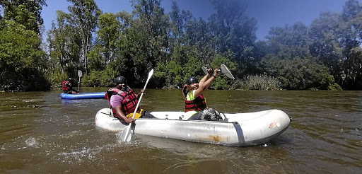 Andrew Mathye and Lebogang Matshoane paddle down the mighty Vaal River.