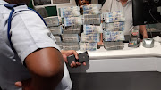 Some of the R1.7m in cash found in the back of a rental vehicle crossing from SA into Botswana last week.