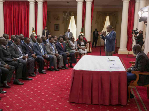 President Uhuru Kenyatta and Deputy President William Ruto during a meeting with leaders from Western region at State House, Nairobi. /FILE