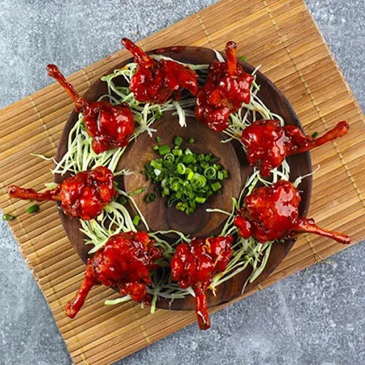 Crunchy Classic Chicken Lollipop In Sriracha Sauce