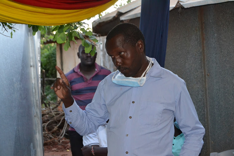 Kyuso subcounty deputy county commissioner Reuben Kimosop addressing a meeting in Kyuso in December last year.