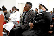 Lungelo Xakaza,  the daughter of the late Fikile Ntshangase, and Nozipho Xakaza  at Ntshangase's funeral at Umphumulo, in KwaMaphumulo, outside Durban.