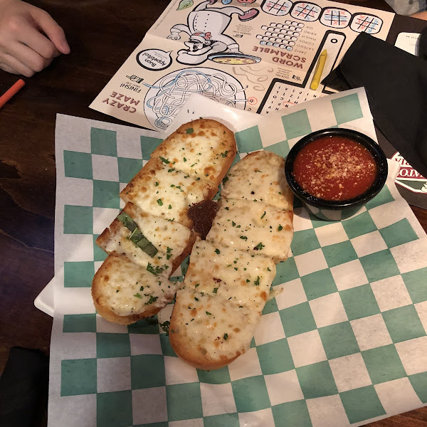 GF garlic bread. Yummy! Notice the green & white checkered paper marking all GF items.