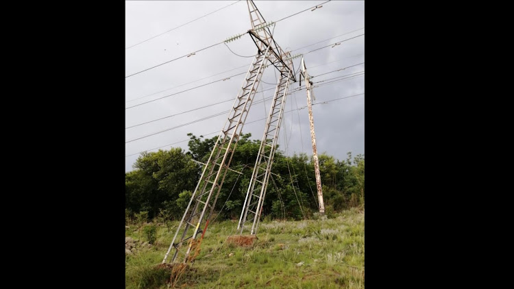 The collapsed power pylon.