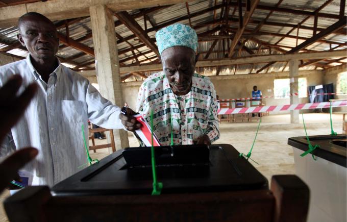 The first domestically run election in Liberia since the bloody civil war attempts to turn the page on a troubled past