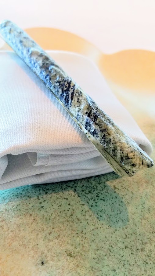 'Razor Clam' with Minerals and Sour Cream snack at Geranium, a three Michelin star restaurant in Copenhagen