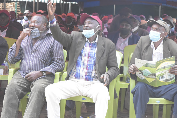 Tea farmers at Theta tea factory in Gatundu South on Thursday.