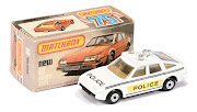 A Rover squad car is among the toy cars sold at the auction.