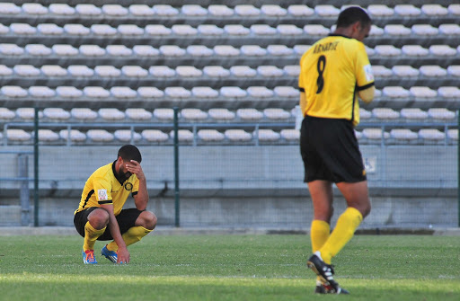 Ricardo Skippers (L) and Tyren Arendse (R) of Santos FC dejected after the National First Division match against Jomo Cosmos at Athlone Stadium on May 03, 2017 in Cape Town, South Africa. (Photo by Grant Pitcher/Gallo Images)