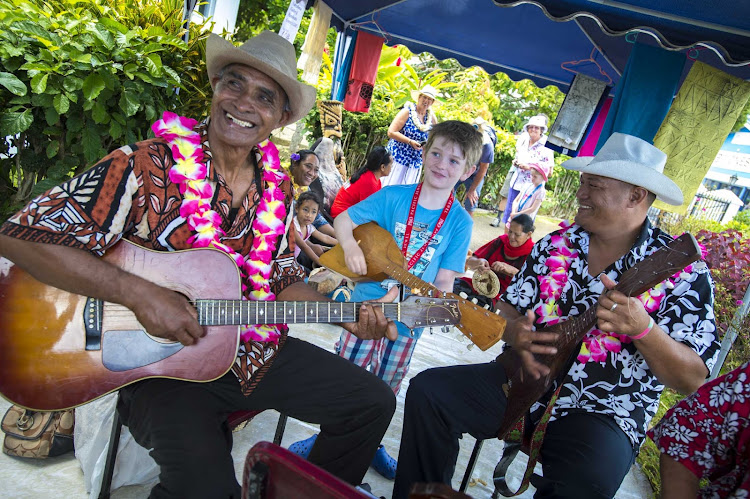 Music lovers of all ages will enjoy the guitarists of Tonga.