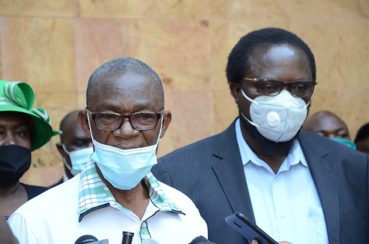 Ford Kenya party Secretary-General Eseli Simiyu and interim Ford Kenya leader Wafula Wamunyinyi addressing journalist outside the offices of the Registrar of Political Parties in Westlands, Nairobi after presenting their documents on June 5, 2020.