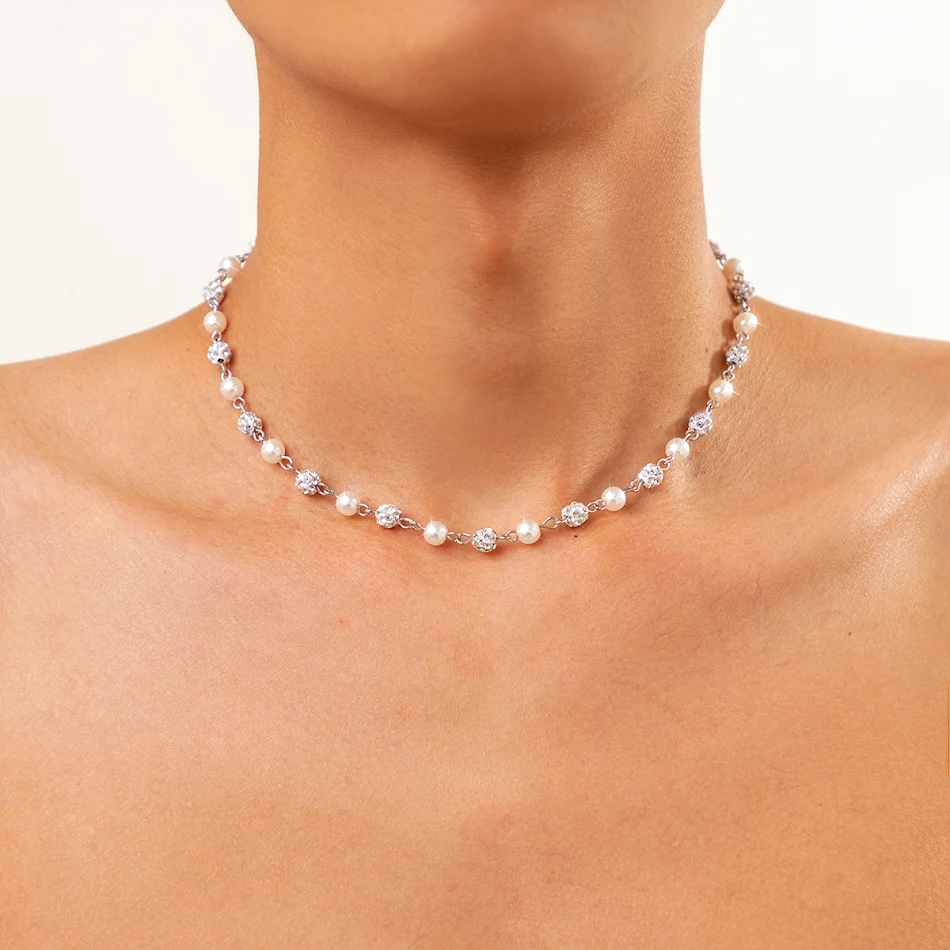 Eenvoudige, elegante parelketting met stiksels voor vrouwen. Voegt een vleugje verfijning toe aan elke outfit, perfect voor dagelijks gebruik.