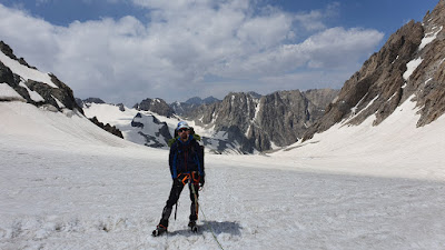 Me posing. Nadezda saddle is in the rear background - on my left side between two sharp rocks