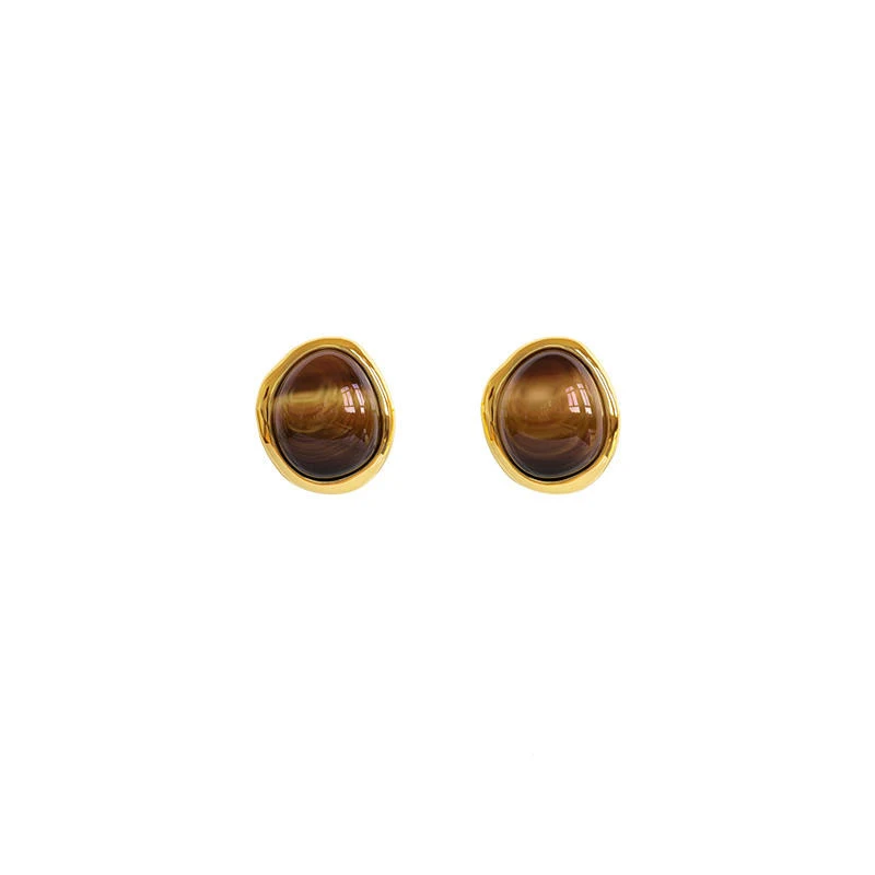 Boucles d'oreilles en jade blanc et oeil de tigre, design spécial mode chinoise, pour un style unique et sophistiqué.