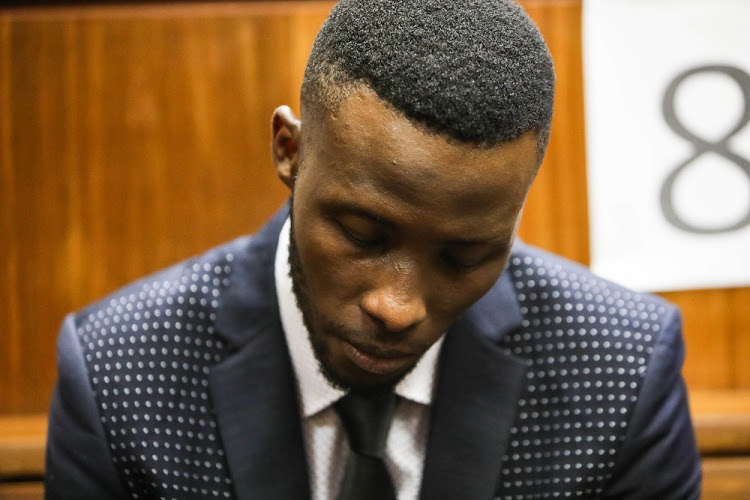 Child killer Onke Mashinini sits in the dock of the South Gauteng High Court in Johannesburg.