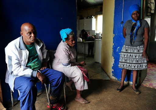 February 05,2017 . Jacob Selebano , Agnes Selebano and Pulane Selebano (Standing). They are mourning the death of their family member and farm worker Sello Jospeh Selebano , 28, who died at his workplace last month. Pic Veli Nhlapo © Sowetan