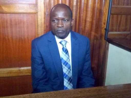 MIgori Governor Okoth Obado in the dock at the Milimani law court, Monday, September 24, 2018. /COURTESY