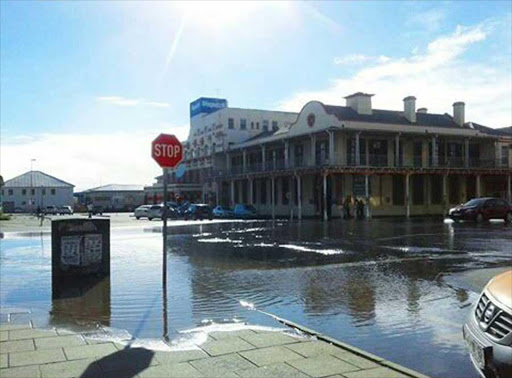 Cambridge Street was flooded with water yesterday PICTURE YANGA ZIWELE