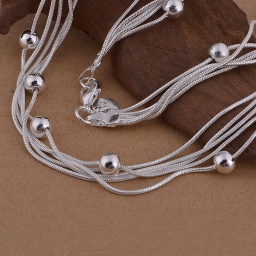 Title 2, Snake bone bead necklace