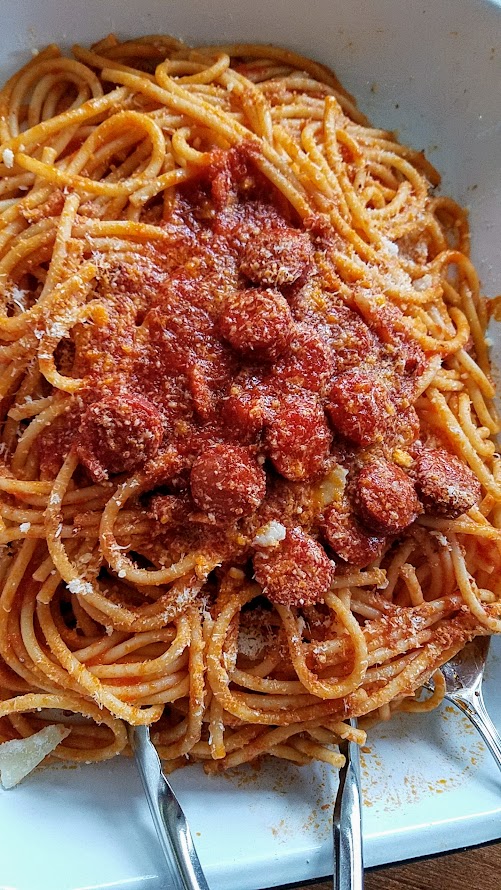 JunJun Jollibee Dinner held at Cooper's Hall celebrating and inspired by the iconic fast food chain: Spaghetti with bucatini, garlic tomato butter, porkbelly, hotdog, pecorino, toasted breadcrumb and wild honey