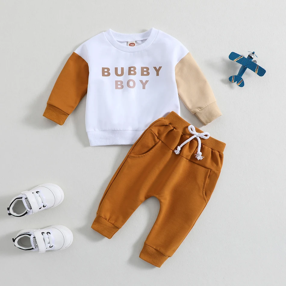 Alfabet print lange mouwen trui en effen kleur broek tweedelige set. Perfect voor een comfortabele en casual outfit voor dagelijks gebruik.