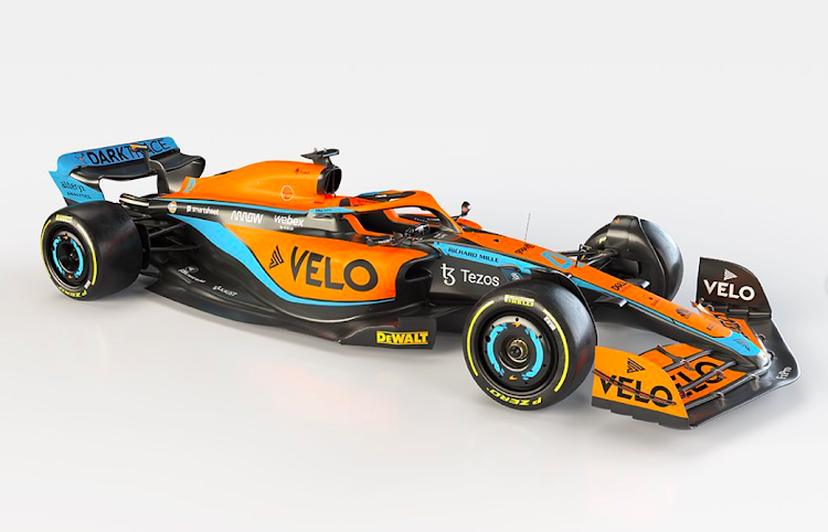 The MCL36 features sleek, swept-back aerodynamics and bigger 18-inch wheels, sporting the 2022 look ushered in by a radical rules overhaul aimed at improving wheel-to-wheel racing.