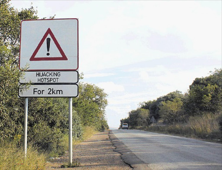 Signs warning of hijacking hotspots