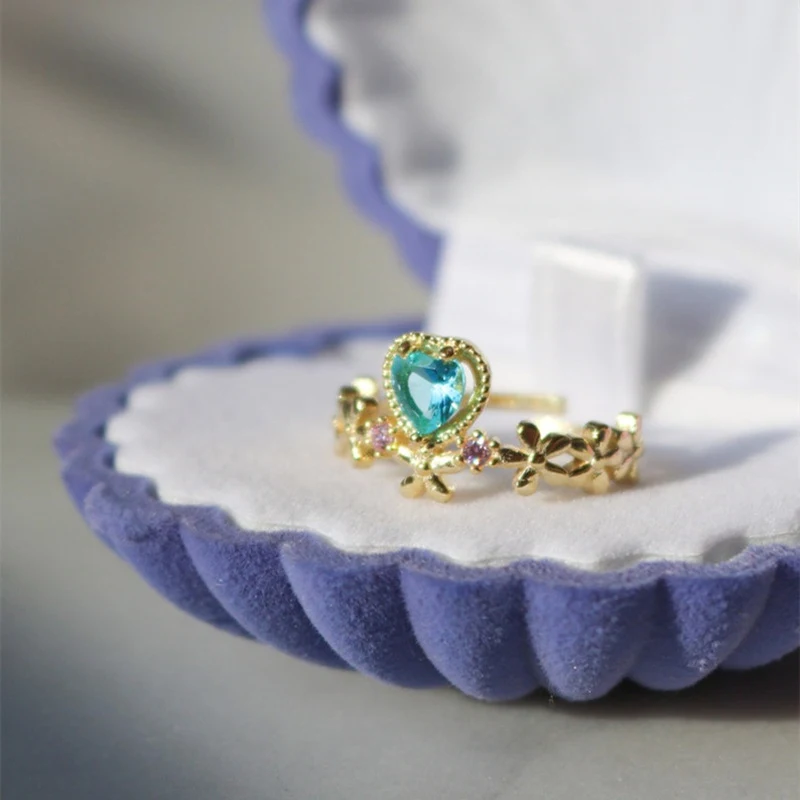 Bague fleur saphir en forme de cœur pour femmes, réglable, un bijou parfait pour un cadeau exprimant l'amour et la délicatesse.