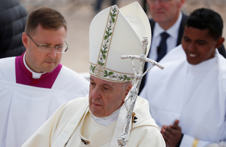 Pope Francis arrives to celebrate Sunday Mass at the diocesan grounds of Soamandrakizay in Antananarivo, Madagascar, September 8.