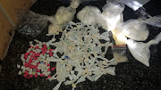 Durban police confiscated drugs with a street value of R126,000 from a flat on Friday.